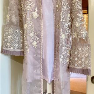 lavender jacket, trouser and inner slip.